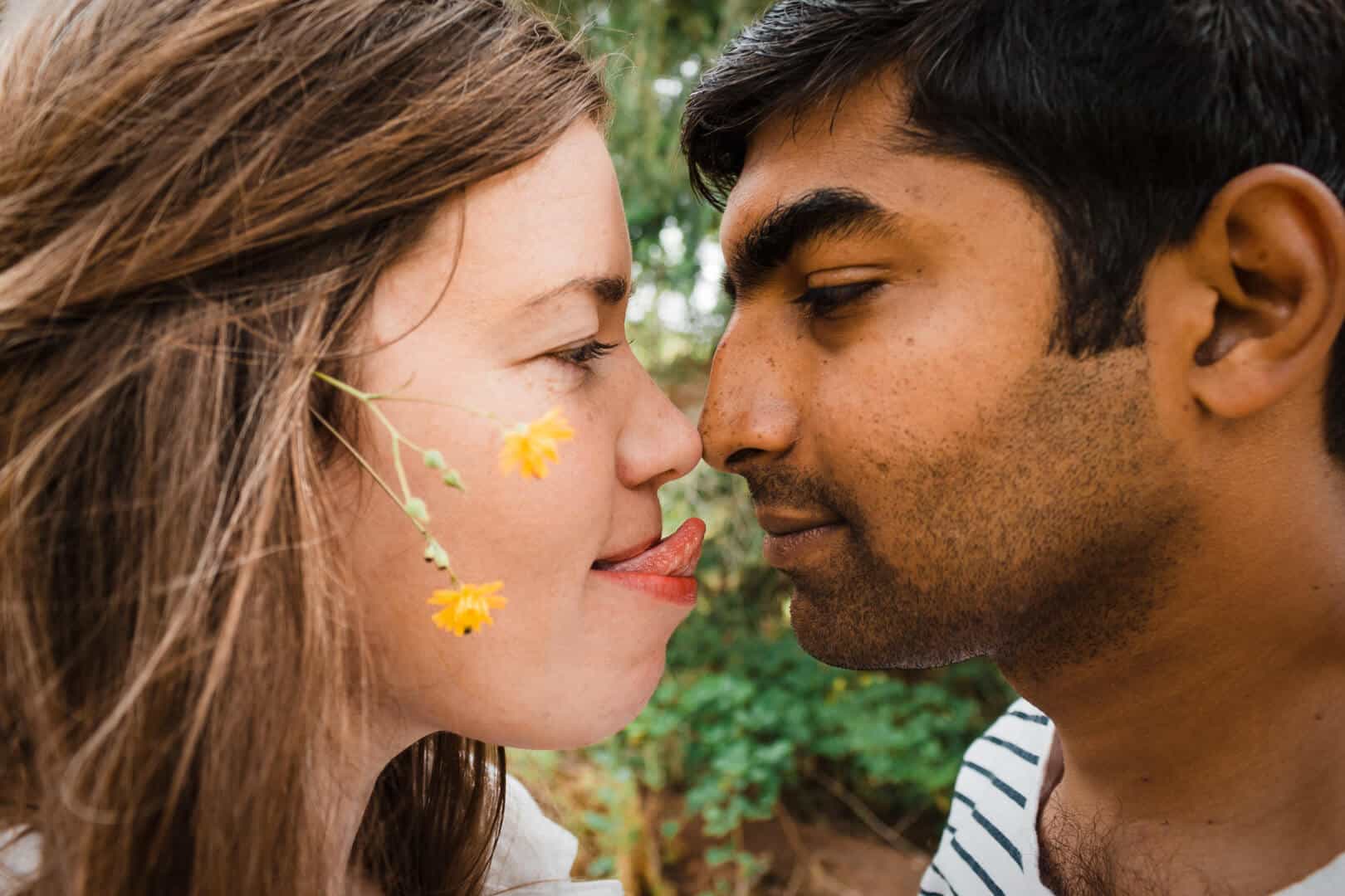 wife sticking her tongue out at husband