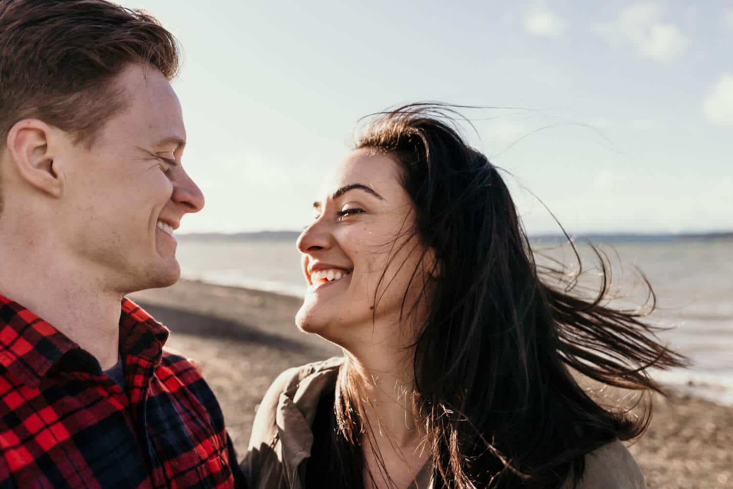 couple laughing on beach